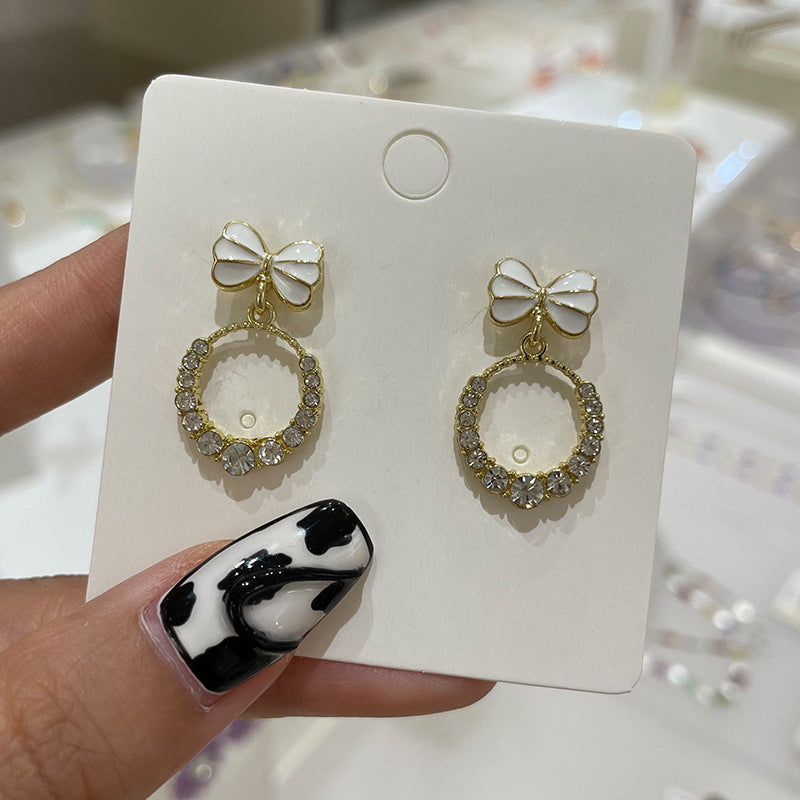 Wholesale Bow Oil Dripping Diamond Snowflake Earrings